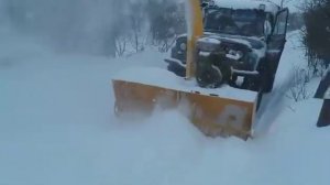 Роторный снегоуборщик