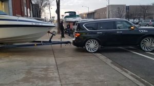 2014 infinity qx56 on 28s with it's 2014 crown line 25' cutty 454 getting detailed.