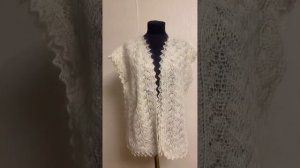 Пуховые ажурные жилетки