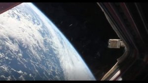 Вид на планету Земля из иллюминатора