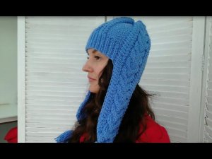 Голубая шапка ушанка косами