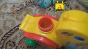 Детская развивающая игрушка утка.Игрушка каталка