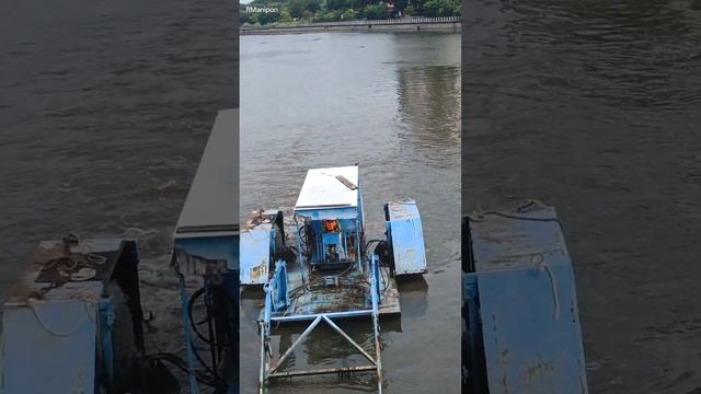 Dredging and aquatic Weed Harvesting on Kallang Basin River #Singapore. #dredge #weedmower #mower