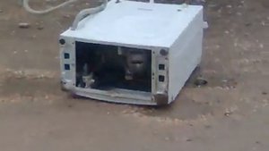 Камень в стиральную машинку.