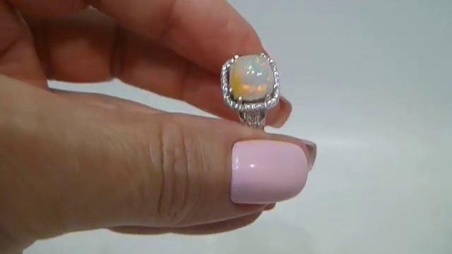 Кольцо с натуральным эфиопским опалом 2.87 ct в огранке кушон Размер 17.5 Серебро 925 смотреть онлайн