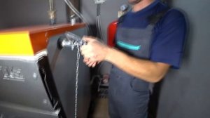 Установка твёрдотопливного котла фирмы TIS.
