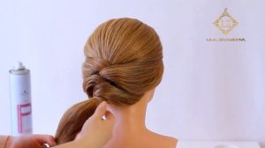 Прическа на длинные волосы.Пучок