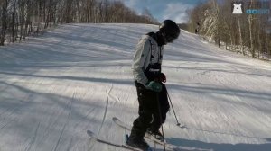 How to do sliding 360's down the hill on skis