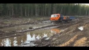 КАМАЗ и Урал транспортеры на гусеницах в грязи!страшный сон водителя!русская техника в сибирь