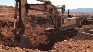 Caterpillar 365C And Caterpillar 245 Excavators Loading Man And Mercedes Trucks