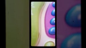 прикольный игрушечный телефон и кукла