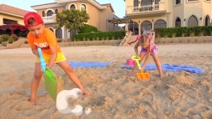 Diana and Roma play on the Beach