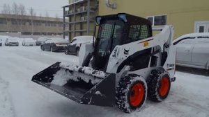 Работа Bobcat по уборке снега