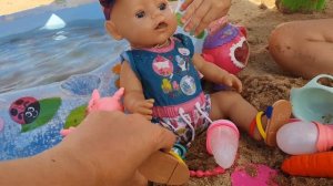 Беби Бон на пляже загорает купается /baby born on the sea /играет в песочнице КАК МАМА кукла