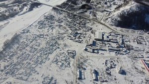 Поселок Усть-Омчуг. Колыма. Тенькинский район. Вид с дрона. Февраль 2021 год