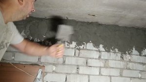 Отделка стены гаража под камень