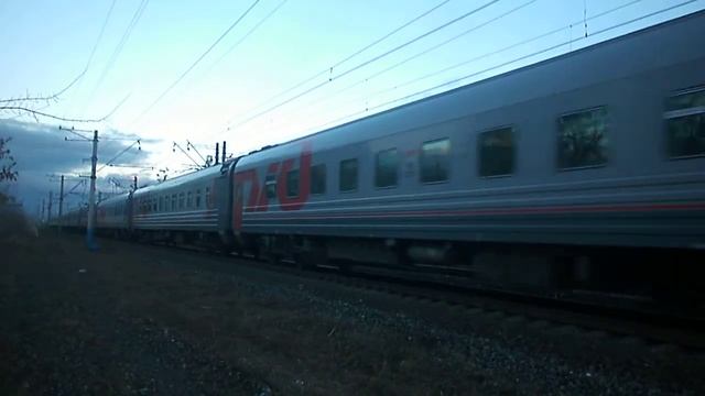 Тепловоз 2ТЭ10УТ-0047А с фирменным поездом «Оренбуржье» смотреть онлайн