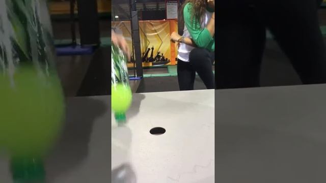 Backwards bottle flip challenge at Rockin jump