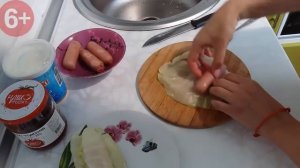 Сосиски в капустных листьях. Рецепты вкусного и простого быстрого приготовления.