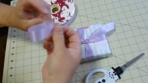 How to tie a Ribbon around a box or gift (tutorial)