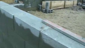 Кладка цоколя дома . Блок Демлер