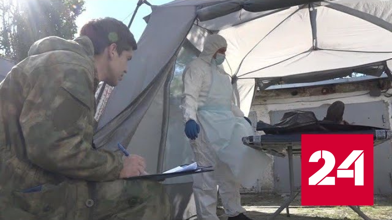 В Луганске перезахоронили останки жертв украинских националистов - Россия 24