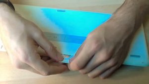 Logitech K750, замена батарейки