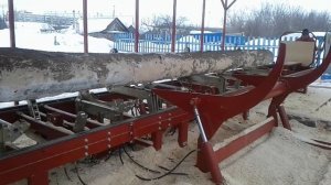 Погрузка бревна на угловой двухдисковый станок БАРС 5