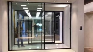 Алюминиевые раздвижные двери ALUMIL S650 с автоматическим закрытием