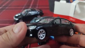 Unboxing die cast scale model 1/43 Rastar BMW 750 Li Mattel