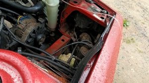 слить антифриз из расширительного бачка Renault 21