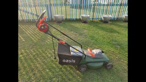 Ремонт кнопки блокировки пуска,на электрической газонокосилке Oasis GE-16