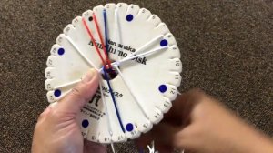 Плетеный браслет Кумихимо.