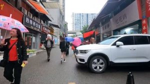 Many unemployed women stand on the streets, in the real Yubei District of Chongqing, China