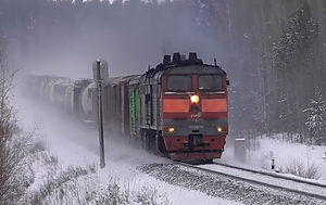 Тепловоз 2ТЭ10У-0398 с грузовым поездом. 02.01.2019.