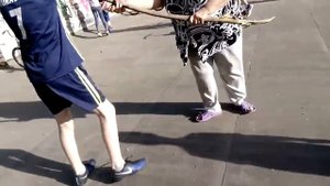 Злая бабка била пацана палкой за то что он, пинал мяч.