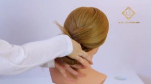 Прическа на длинные волосы.Легкий пучок