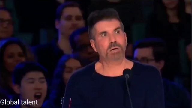 ساحر عالمي ذهبي يصدم الجميع ويحصل على الباز الذهبي في برنامج المواهب الأمريكية 2024
