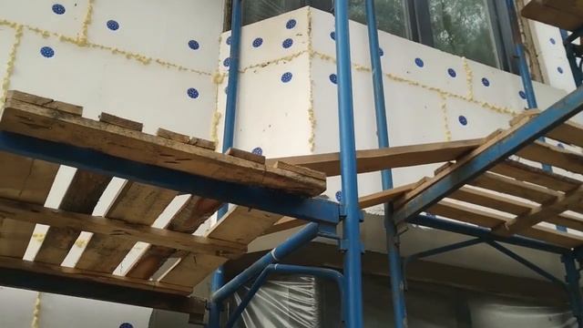 Отделка фасадов панельного дома Бенпан по технологии СФТК Мокрый Фасад, пенополистирол как демпфер