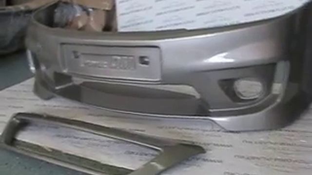 Передний бампер с решеткой радиатора Lada Largus смотреть онлайн