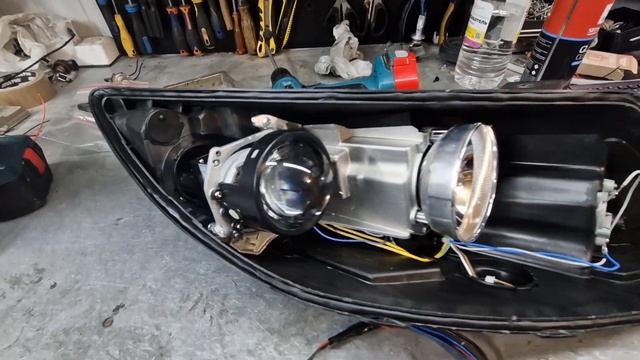 Kia Sportage Замена галогеновых линз на бидиодные лазерные линзы Aozoom BI-LED Laser gen5