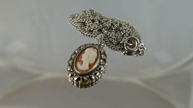 СЕРЕБРЯНАЯ ПОДВЕСКА КАМЕЯ ИЗ МОРСКОЙ РАКОВИНЫ С МАРКАЗИТАМИ. Англия. смотреть онлайн