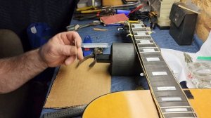 Preparing New frets for a 1972 Gibson Heritage Acoustic Guitar.  Guitar Repair tips..