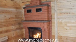 Кассетный камин с топкой Jotul I18 в кирпичной облицовке