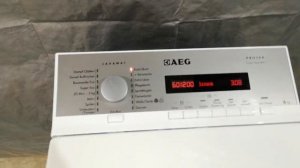 Стиральная машина с вертикальной загрузкой на 6кг. AEG Protex Made in France Inverter A+++ L75265TL