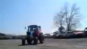 Трактор на задних колесах