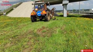 МТЗ с ротационной косилкой для откосов