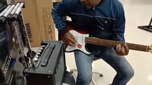 Roland Cube 10 GX with Fender Stratocaster