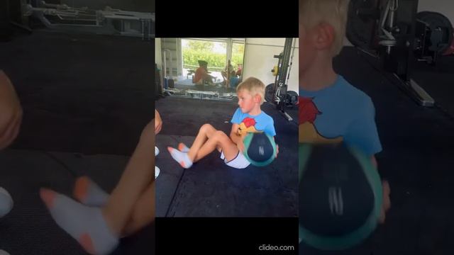 Victoria Azarenka practises with her son