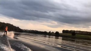 На водных лыжах за резиновой лодкой с мотором 15сил